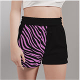black shorts with pink zebra print only on right hand side, slight angle to front on shot