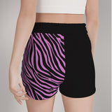 Black shorts with  pink zebra print only on the right handsome only, reverse angle.