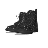 Black boots with white polka dots on a white background