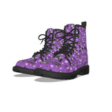 Purple boots with spooky skeleton animal print pattern on a white background by alternawear clothing combat lace up boot side view