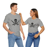 A grey t-shirt with a black pirate skull and crossing cutlasses print on the front by Alternawear, being worn by both a male and female model.
