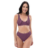 a female model wearing the Alternawear black & pink vertical stripped bikini top and bottoms