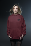 rocker looking model wearing the dark red, 'Til Death Do Us Part' Hoodie by Alternawear.