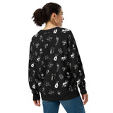 lady facing away showing her back wearing doodle tattoo black and white cardigan alternative