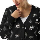 close up of lady wearing doodle tattoo black and white cardigan alternative