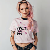 cute punk girl wearing pink witch t-shirt with cat on front