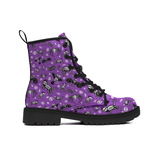 Purple boots with spooky skeleton animal print pattern on a white background by alternawear clothing combat lace up boot side view