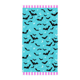 blue bat print gothic beach towel mock up on plain white background