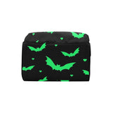 base shot of nappy diaper bag which is black with bright green bats and mini heart print