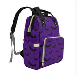 Wickeltasche für Babys mit Fledermäusen in Schwarz und Lila