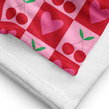 checkered cherry and heart print rockabilly style towel folded close up