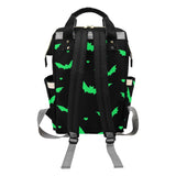 Back print of changing nappy diaper bag  showing straps and bright green bats and mini heart print